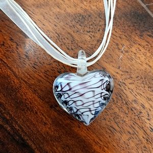 Cute purple and white glass looking necklace with white lace chain